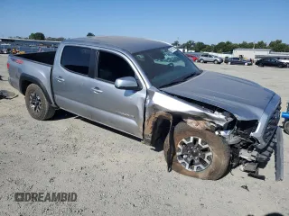 2023 Toyota Tacoma SR with VIN 3TMCZ5AN3PM645372, listed as a Copart auction lot 59917365 with 27,146 mi miles and Salvage title. Bid and sale history available at DreamBid. Image 4.