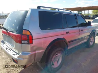 2001 Mitsubishi Montero ES z VIN JA4LS21HX1P041052, wystawiony jako IAAI lot #42084599 z przebiegiem 239 095 mil mil oraz . Historia ofert i sprzedaży dostępna na DreamBid. Obrazek 4.