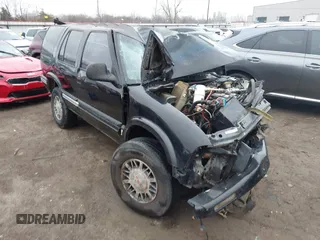 1996 GMC Jimmy SL with VIN 1GKDT13W8T2508115, listed as a IAAI auction lot 41499691 with 264,526 mi miles. Bid and sale history available at carsss.com. Image 1.