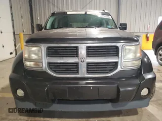 2008 Dodge Nitro SXT z VIN 1D8GT28K28W246131, wystawiony jako Copart lot #60037665 z przebiegiem 119 831 mil mil oraz Szkoda całkowita • Salvage title. Historia ofert i sprzedaży dostępna na DreamBid. Obrazek 5.