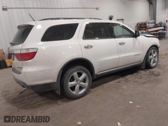 2011 Dodge Durango Citadel with VIN 1D4RE5GG3BC731017, listed as a IAAI auction lot 41406363 with 202,960 mi miles. Bid and sale history available at carsss.com. Image 4.