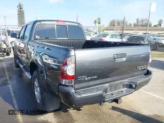 2009 Toyota Tacoma PreRunner with VIN 3TMKU72N99M021678, listed as a IAAI auction lot 41763776 with 155,381 mi miles and . Bid and sale history available at DreamBid. Image 3.
