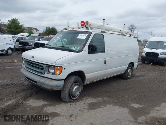 2002 Ford Econoline Cargo with VIN 1FTNE24L02HB73531, listed as a IAAI auction lot 41676620 with 125,683 mi miles and . Bid and sale history available at DreamBid. Image 2.