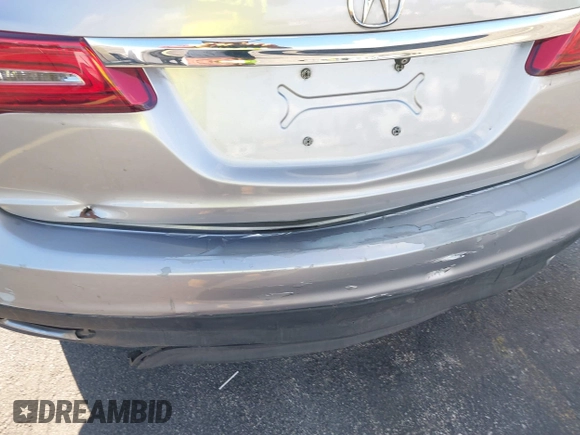 2016 Acura MDX w/Tech with VIN 5FRYD3H46GB004113, listed as a IAAI auction lot 41671704 with 141,476 mi miles. Bid and sale history available at carsss.com. Image 17.