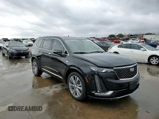 2021 Cadillac XT6 Premium Luxury z VIN 1GYKPCRS6MZ207546, wystawiony jako Copart lot #85995814 z przebiegiem 30 885 mil mil oraz Czysty tytuł • Clean title. Historia ofert i sprzedaży dostępna na DreamBid. Obrazek 14.
