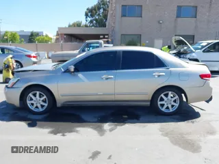 2003 Honda Accord LX z VIN JHMCM56363C033148, wystawiony jako IAAI lot #42261935 z przebiegiem 182 033 mil mil oraz . Historia ofert i sprzedaży dostępna na DreamBid. Obrazek 15.