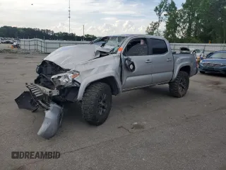 2021 Toyota Tacoma SR5 with VIN 5TFAZ5CN9MX108211, listed as a Copart auction lot 54353985 with 77,226 mi miles and Salvage title. Bid and sale history available at DreamBid. Image 1.