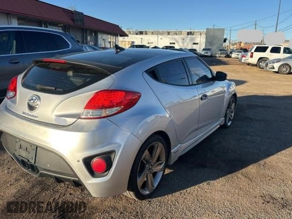 2013 Hyundai Veloster Turbo with VIN KMHTC6AE7DU115884, listed as a Copart auction lot 84959054 with 152,133 mi miles and Clean title. Bid and sale history available at DreamBid. Image 4.