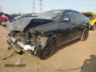2021 BMW X6 M50i with VIN 5UXCY8C05M9H31042, listed as a Copart auction lot 64614714 with 0 mi miles and Salvage Title. Bid and sale history available at carsss.com. Image 1.