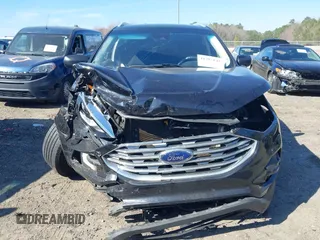 2020 Ford Edge SE z VIN 2FMPK3G97LBA92060, wystawiony jako IAAI lot #41791142 z przebiegiem 59 578 mil mil oraz . Historia ofert i sprzedaży dostępna na DreamBid. Obrazek 13.