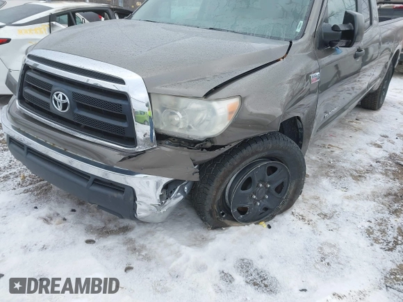 2010 Toyota Tundra 4WD Truck with VIN 5TFCY5F13AX009786, listed as a IAAI auction lot 41354641 with 204,918 mi miles. Bid and sale history available at carsss.com. Image 6.