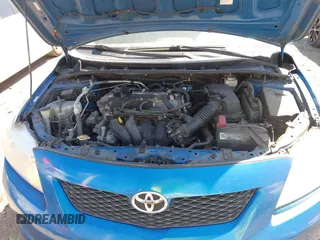 2009 Toyota Corolla with VIN 1NXBU40EX9Z065519, listed as a IAAI auction lot 42057981 with 201,480 mi miles. Bid and sale history available at carsss.com. Image 10.