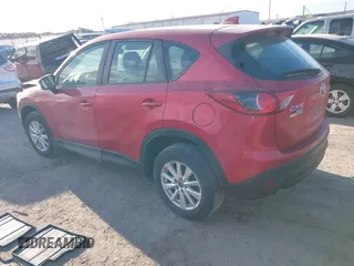 2014 Mazda CX-5 Sport with VIN JM3KE4BE6E0370104, listed as a IAAI auction lot 41879275 with 183,882 mi miles. Bid and sale history available at carsss.com. Image 3.