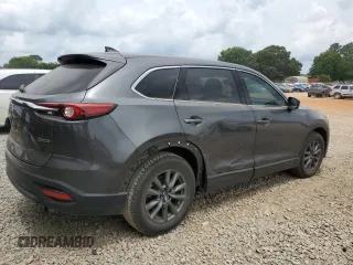 2020 Mazda CX-9 Touring z VIN JM3TCACY3L0411822, wystawiony jako Copart lot #60323295 z przebiegiem 61 348 mil mil oraz Szkoda całkowita • Salvage title. Historia ofert i sprzedaży dostępna na DreamBid. Obrazek 3.
