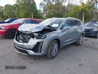 2023 Cadillac XT6 AWD Premium Luxury with VIN 1GYKPDRS0PZ158595, listed as a IAAI auction lot 41051122 with 39,653 mi miles and . Bid and sale history available at DreamBid. Image 2.