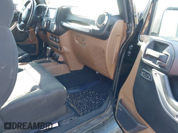 2011 Jeep Wrangler Rubicon with VIN 1J4HA6D14BL508098, listed as a IAAI auction lot 41423284 with 49,840 mi miles and . Bid and sale history available at carsss.com. Image 5.
