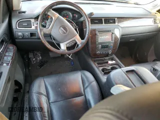 2013 GMC Yukon Denali with VIN 1GKS1EEF0DR205906, listed as a Copart auction lot 87969385 with 128,283 mi miles and Salvage Title. Bid and sale history available at carsss.com. Image 8.