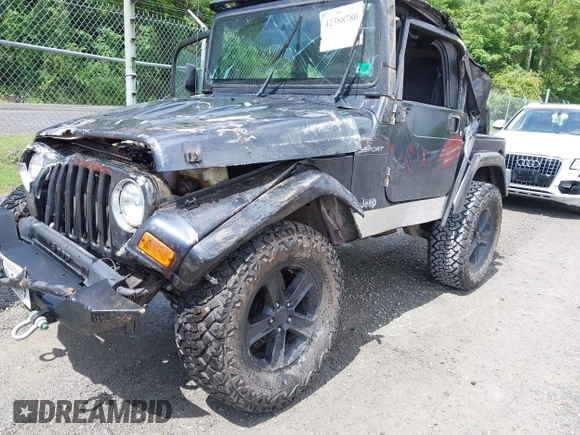 2003 Jeep Wrangler Sport z VIN 1J4FA49S53P317779, wystawiony jako IAAI lot #42388780 z przebiegiem Nie podano mil oraz . Historia ofert i sprzedaży dostępna na DreamBid. Obrazek 16.