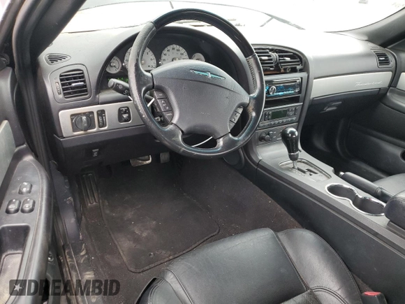 2005 Ford Thunderbird Deluxe z VIN 1FAHP60A25Y103624, wystawiony jako Copart lot #58043635 z przebiegiem 121 881 mil mil oraz Tytuł czysty. Historia ofert i sprzedaży dostępna na DreamBid. Obrazek 8.