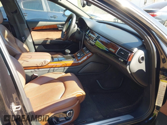2013 Audi A8 3.0L with VIN WAURGAFD0DN005532, listed as a IAAI auction lot 42113540 with 176,635 mi miles and . Bid and sale history available at DreamBid. Image 5.