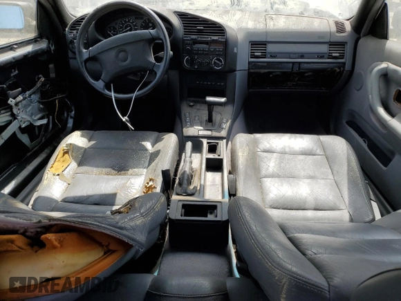 1994 BMW 3 Series 318iC with VIN WBABK6329RED16256, listed as a Copart auction lot 67191674 with 113,073 mi miles and Salvage Title. Bid and sale history available at carsss.com. Image 8.
