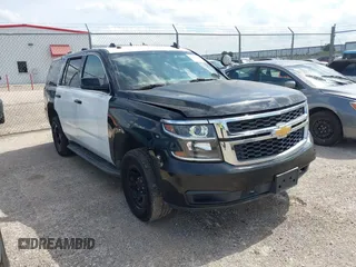 2017 Chevrolet Tahoe Commercial z VIN 1GNLCDEC2HR187691, wystawiony jako IAAI lot #42495430 z przebiegiem 87 802 mil mil oraz . Historia ofert i sprzedaży dostępna na DreamBid. Obrazek 1.