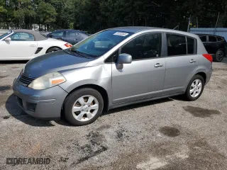 2009 Nissan Versa 1.8 S with VIN 3N1BC13E29L409875, listed as a Copart auction lot 74153064 with 214,372 mi miles and Clean Title. Bid and sale history available at carsss.com. Image 1.
