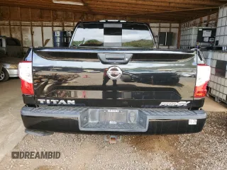 2018 Nissan Titan Pro-4X z VIN 1N6AA1E51JN531463, wystawiony jako Copart lot #52995885 z przebiegiem 62 873 mil mil oraz Szkoda całkowita • Salvage title. Historia ofert i sprzedaży dostępna na DreamBid. Obrazek 6.