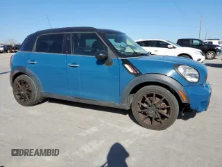 2012 MINI Countryman S with VIN WMWZC3C5XCWM27675, listed as a Copart auction lot 49676205 with 111,499 mi miles and Salvage title. Bid and sale history available at DreamBid. Image 4.