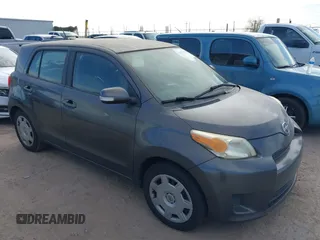 2010 Scion xD with VIN JTKKU4B47A1004359, listed as a IAAI auction lot 41576996 with 138,447 mi miles. Bid and sale history available at carsss.com. Image 1.