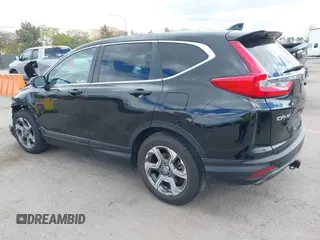 2019 Honda CR-V EX with VIN 5J6RW1H56KA030445, listed as a IAAI auction lot 42043513 with 137,087 mi miles. Bid and sale history available at carsss.com. Image 3.