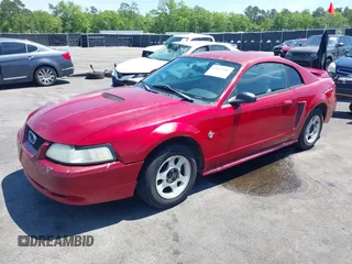 1999 Ford Mustang with VIN 1FAFP4042XF229616, listed as a IAAI auction lot 42047185 with 287,758 mi miles and . Bid and sale history available at DreamBid. Image 17.