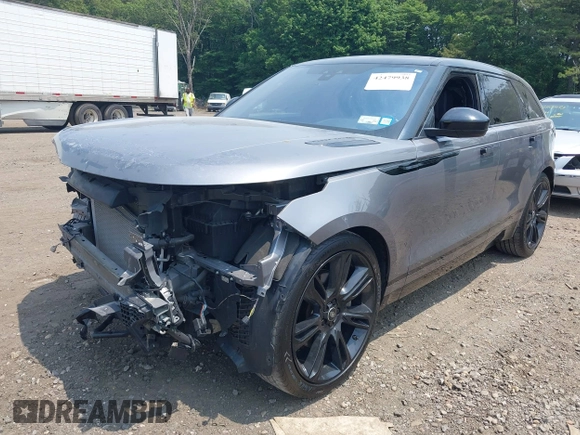2020 Land Rover Range Rover Velar z VIN SALYM2EV8LA274870, wystawiony jako IAAI lot #42479938 z przebiegiem 43 039 mil mil oraz . Historia ofert i sprzedaży dostępna na DreamBid. Obrazek 18.