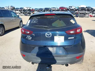 2017 Mazda CX-3 Sport with VIN JM1DKFB73H0159678, listed as a IAAI auction lot 40953743 with 99,696 mi miles. Bid and sale history available at carsss.com. Image 16.