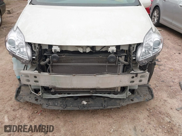 2013 Toyota Prius One z VIN JTDKN3DU3D5591734, wystawiony jako IAAI lot #42381581 z przebiegiem 202 128 mil mil oraz . Historia ofert i sprzedaży dostępna na DreamBid. Obrazek 6.