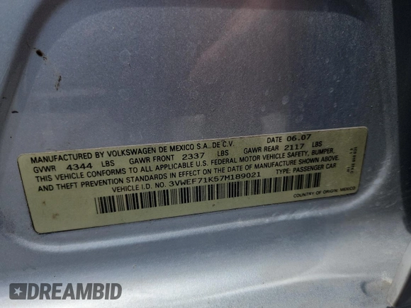 2007 Volkswagen Jetta Wolfsburg Edition z VIN 3VWEF71K57M189021, wystawiony jako Copart lot #59019685 z przebiegiem 124 720 mil mil oraz Szkoda całkowita • Salvage title. Historia ofert i sprzedaży dostępna na DreamBid. Obrazek 13.