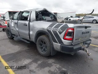 2021 Ram 1500 Rebel with VIN 1C6SRFLT0MN734774, listed as a IAAI auction lot 41075676 with 95,808 mi miles and . Bid and sale history available at DreamBid. Image 3.