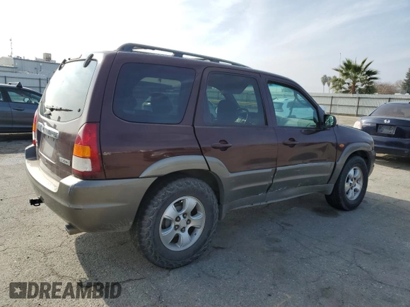 2002 Mazda Tribute LX with VIN 4F2CU08172KM34759, listed as a Copart auction lot 81631974 with 254,286 mi miles and Salvage Title. Bid and sale history available at carsss.com. Image 3.