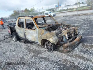 2004 Ford Explorer Sport Trac XLS z VIN 1FMZU67K64UC34904, wystawiony jako IAAI lot #41989757 z przebiegiem Nie podano mil oraz . Historia ofert i sprzedaży dostępna na DreamBid. Obrazek 1.