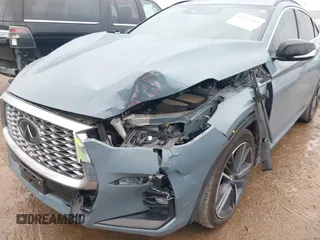 2023 Infiniti QX55 Luxe z VIN 3PCAJ5JRXPF109797, wystawiony jako IAAI lot #41455665 z przebiegiem 31 561 mil mil oraz . Historia ofert i sprzedaży dostępna na DreamBid. Obrazek 6.