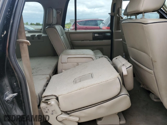2007 Lincoln Navigator z VIN 5LMFL28517LJ16273, wystawiony jako Copart lot #57958745 z przebiegiem 830 595 mil mil oraz Szkoda całkowita • Salvage title. Historia ofert i sprzedaży dostępna na DreamBid. Obrazek 5.