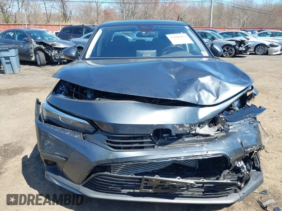 2024 Honda Civic EX z VIN 2HGFE1F76RH314980, wystawiony jako IAAI lot #42000094 z przebiegiem 13 576 mil mil oraz . Historia ofert i sprzedaży dostępna na DreamBid. Obrazek 12.