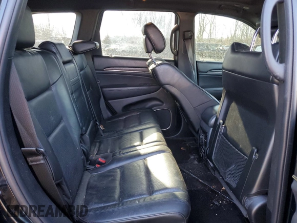 2018 Jeep Grand Cherokee High Altitude with VIN 1C4RJFCG3JC488022, listed as a Copart auction lot 87700385 with 94,390 mi miles and Salvage title. Bid and sale history available at DreamBid. Image 11.