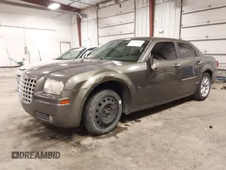 2010 Chrysler 300 Touring with VIN 2C3CA5CV9AH213299, listed as a IAAI auction lot 41754215 with 172,467 mi miles. Bid and sale history available at carsss.com. Image 23.
