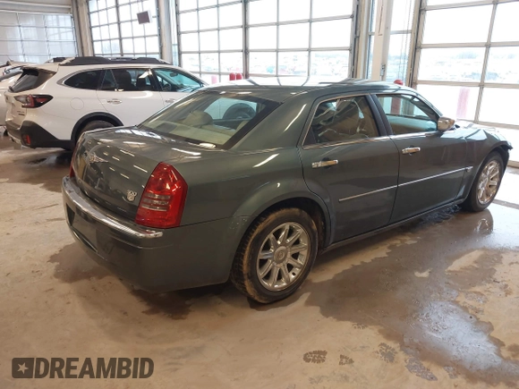2005 Chrysler 300 with VIN 2C3JA63H95H111269, listed as a IAAI auction lot 41717805 with 102,740 mi miles. Bid and sale history available at carsss.com. Image 4.