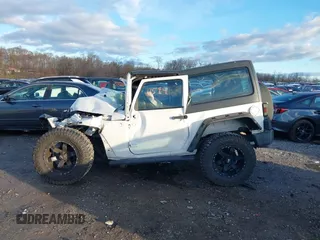 2015 Jeep Wrangler Sport with VIN 1C4AJWAG0FL516351, listed as a IAAI auction lot 41178594 with 49,700 mi miles and . Bid and sale history available at DreamBid. Image 13.
