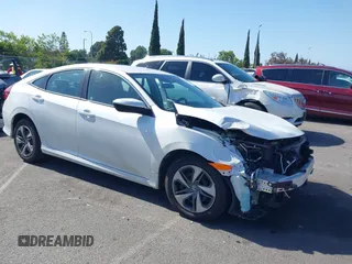 2020 Honda Civic LX z VIN 19XFC2F67LE212561, wystawiony jako IAAI lot #42272481 z przebiegiem 50 681 mil mil oraz . Historia ofert i sprzedaży dostępna na DreamBid. Obrazek 1.