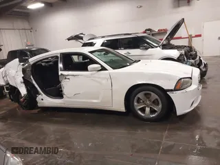2013 Dodge Charger SE with VIN 2C3CDXBG2DH726467, listed as a IAAI auction lot 38024398 with 232,387 mi miles and . Bid and sale history available at carsss.com. Image 14.