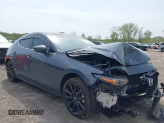 2020 Mazda 3 Premium with VIN JM1BPBNM3L1171285, listed as a IAAI auction lot 42097340 with 50,799 mi miles and . Bid and sale history available at DreamBid. Image 1.