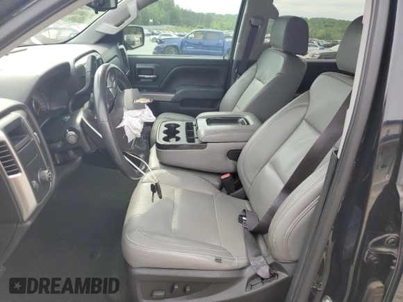 2016 Chevrolet Silverado 1500 LT with VIN 3GCPCRECXGG280013, listed as a Copart auction lot 54097785 with 60,691 mi miles and Salvage Title. Bid and sale history available at DreamBid. Image 7.